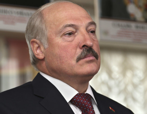 Belarusian President Alexander Lukashenko, at a polling station during parliamentary elections in Minsk, Belarus, Sunday, Sept. 23, 2012. Belarus is holding parliamentary elections Sunday without the main opposition parties, which boycotted the vote to protest the detention of political prisoners and opportunities for election fraud. (AP Photo/Sergei Grits)