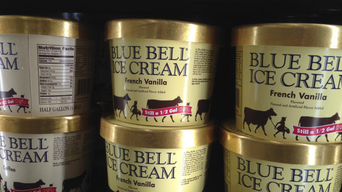 FILE - In this April 10, 2015, file photo, Blue Bell ice cream rests on a grocery store shelf in Lawrence, Kan. Blue Bell Creameries will lay off more than a third of its workforce following a series of listeria illnesses linked to its ice cream that prompted a nationwide recall, the Texas company announced Friday, May 15, 12015. (AP Photo/Orlin Wagner, File)