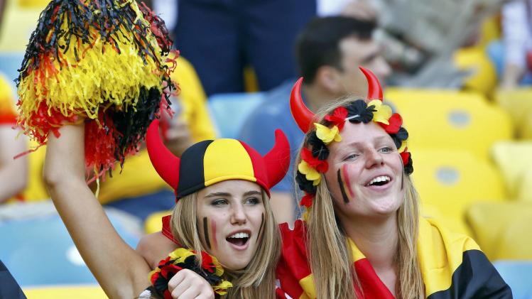 Belgium fans wait for the start of the 2014 World Cup Group H soccer match between Russia and Belgium at the Maracana stadium in Rio de Janeiro