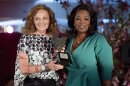 Diane von Furstenberg presents Oprah Winfrey with the DVF Lifetime Leadership Award at The Third Annual DVF Awards held at the United Nations in New York, Friday, March 9, 2012. (AP Photo/Charles Sykes)