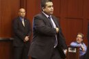 George Zimmerman enters the courtroom for his trial in Sanford