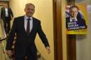 Candidate for the presidential election Andrej Kiska arrives at a party election centre to observe the ongoing election results in Bratislava