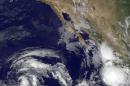 This July 13, 2015 NOAA satellite image shows Tropical Strom Dolores strengthening off Mexico's Pacific coast before it turned into a hurricane