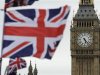 Flags are seen above a souvenir kiosk near Big Ben clock at the Houses of Parliament in central London