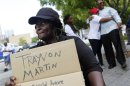 Richardson holds a sign before a rally for Trayvon Martin in Miami