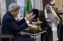 U.S. Secretary of State John Kerry, left, speaks with Saudi Arabia's King Abdullah before their meeting in Rawdat Khurayim, a secluded royal hunting retreat in Saudi Arabia, Sunday, Jan. 5, 2014. (AP Photo/Brendan Smialowski, Pool)