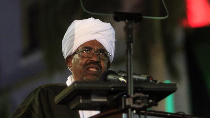 Sudanese President Omar al-Bashir speaks during a celebration to mark 59 years of independence from Britain, in Khartoum on December 31, 2014