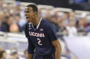 Connecticut forward DeAndre Daniels reacts during the first half of an NCAA Final Four tournament college basketball semifinal game against Florida Saturday, April 5, 2014, in Arlington, Texas. (AP Photo/Eric Gay)