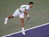 Novak Djokovic of Serbia serves against Fabio Fognini of Italy during their match at the BNP Paribas Open ATP tennis tournament in Indian Wells, California