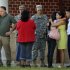 William Noonan, left, and his daughter Sheminith Noonan, second from the right, react as they leave the arraignment for Spc. Neftaly Platero, Monday Sept. 12, 2011 in Fort Stewart, Ga. Platero, a soldier with the Army's 3rd Infantry Division, is charged with killing William Noonan's son, Pfc. Gebrah Noonan and one other soldier along with attempted premeditated murder of a third soldier. (AP Photo/Stephen Morton)