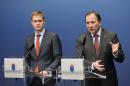 Sweden's Prime Minister Stefan Lofven, right, of the Social Democrats, and Minister of Education Gustav Fridolin, left, of the Green Party, give a press conference at the government chancellery in Stockholm, Sweden, Wednesday December 3, 2014, where Lofven announced fresh elections after his coalition government failed to get its budget through parliament. (AP Photo / TT News Agency / Pontus Lundahl) SWEDEN OUT