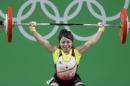 Hiromi Miyake, of Japan, competes in the women's 48kg weightlifting competition at the 2016 Summer Olympics in Rio de Janeiro, Brazil, Saturday, Aug. 6, 2016. (AP Photo/Mike Groll)