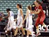 North Carolina State's Marissa Kastanek, right, reacts as Duke players Chelsea Gray (12), Allison Vernerey (43) and Tricia Liston (32) walk off the court after North Carolina State's 75-73 win in an Atlantic Coast Conference NCAA college baketball tournament game in Greensboro, N.C., Friday, March 2, 2012. (AP Photo/Chuck Burton)