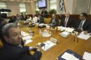 Israel's Minister Ehud Barak, left, sits across from the Prime Minister Benjamin Netanyahu during the weekly cabinet meeting in Jerusalem Sunday, April 29, 2012. (AP Photo/Ronen Zvulun, Pool)