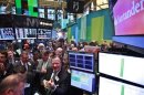 Traders await the Grupo Financiero Santander's first trade following it's IPO on the floor of the New York Stock Exchange