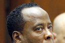 FILE - This Oct. 3, 2011 file photo shows Dr. Conrad Murray listening to testimony during Murray's trial in the death of pop star Michael Jackson in Los Angeles. A judge refused Friday Feb. 24, 2012 to release Michael Jackson's doctor on bail while he appeals his conviction for involuntary manslaughter in the pop star's death.(AP Photo/Mario Anzuoni, Pool, File )