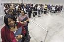 FILE - In this Wednesday, Oct. 19, 2016, file photo, Kanockwa Horton, left, from Stone Mountain, and Jacqueline Merritt, from Atlanta, stand first in line at the Airport Community Job Fair, in Atlanta, joined by hundreds of other applicants in line before the 10 a.m. opening. On Friday, Nov. 4, 2016, the Labor Department issues its jobs report for October. (Bob Andres/Atlanta Journal-Constitution via AP, File)