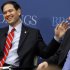 Senate Foreign Relations Committee member Sen. Marco Rubio, R-Fla., left, jokes with Sen. Joseph Lieberman, I-Conn., before Rubio spoke about foreign policy at the Brookings Institution, in Washington, Wednesday, April 25, 2012. (AP Photo/Jacquelyn Martin)