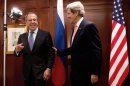 U.S. Secretary of State John Kerry, right, meets with Russian Foreign Minister Sergey Lavrov in Berlin on Tuesday, Feb. 26, 2013. Berlin is the second stop in Kerryâ€™s first trip overseas as Secretary of State. (AP Photo/dpa,Maurizio Gambarini)