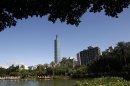 Taipei 101 skyscraper is seen through a natural park setting in Taipei, Taiwan, Thursday, July 28, 2011. The Taipei 101 on Thursday received the highest platinum certification under the U.S. Green Building Council's Leadership in Energy and Environmental Design standards for an existing building. The 101-story tower stands at 1,667 feet and has more than 2.5 million square feet of space. (AP Photo/Wally Santana)