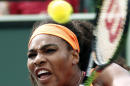 Serena Williams, of the United States, returns the ball to Monica Niculescu, of Romania, during their match at the Miami Open tennis tournament in Key Biscayne, Fla., Saturday, March 28, 2015. (AP Photo/J Pat Carter)