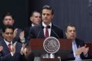 Enrique Pena Nieto looks on during his speech in the presentation of the fiscal reform at Los Pinos presidential residence in Mexico City
