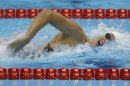 France's Camille Muffat competes in a women's 400-meter freestyle swimming heatat the 2012 Summer Olympics, Sunday, July 29, 2012, in London. (AP Photo/Daniel Ochoa De Olza)