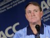 In this photo taken Monday, July 25, 2011, North Carolina coach Butch Davis pauses during interviews at the Atlantic Coast Conference Football Kickoff in Pinehurst, N.C. University of North Carolina Chancellor Holden Thorp announced Wednesday, July 27, 2011, that Davis has been dismissed as head coach of the football program. (AP Photo/Gerry Broome)