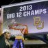 Baylor center Brittney Griner (42) celebrates after cutting down part of the net following their NCAA college basketball championship game against Iowa State in the Big 12 Conference tournament, Monday, March 11, 2013, in Dallas. Baylor won 75-47. (AP Photo/Tony Gutierrez)