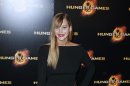 Jennifer Lawrence attends the premiere of The Hunger Games movie in Paris, Thursday, March 15, 2012. (AP Photo/Thomas Padilla)