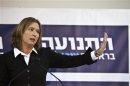 Former Israeli FM Livni gestures during a news conference in Tel Aviv