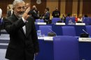 Iran's Ambassador to the International Atomic Energy Agency, IAEA, Ali Asghar Soltanieh waves as he arrives for the IAEA board of governors meeting at the International Center in Vienna, Austria, Monday, Sept. 10, 2012. (AP Photo/Ronald Zak)