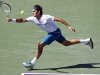 Roger Federer, of Switzerland, returns to Ryan Garrison during the Sony Ericsson Open tennis tournament in Key Biscayne, Fla., Saturday, March 24, 2012. Federer won 6-2, 7-6(3). (AP Photo/Alan Diaz)