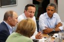 G8 leaders from left, German Chancellor Angela Merkel, Russian President Vladimir Putin, Britain's Prime Minister David Cameron and US President Barack Obama attend a working session during the G-8 summit at the Lough Erne golf resort in Enniskillen, Northern Ireland on Tuesday, June 18, 2013. (AP Photo/Yves Herman, Pool)