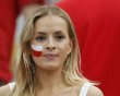 Poland fan reacts before the start of their Group A Euro 2012 soccer match against Greece at the National stadium in Warsaw