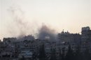 Smoke rises from Aleppo's Saif al-Dawla district after being shelling by, according to activists, forces loyal to Syria's President Bashar al-Assad