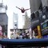 Gymnast Alaina Williams performs on a trampoline in New York's Times Square during U.S. Olympic Team festivities, Wednesday, April 18, 2012. The event marks 100 days until the London Olympics. (AP Photo/Bebeto Matthews)