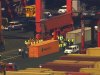 This image made from video provided by Eyewitness News WABC-TV shows an aerial view near a container ship in Newark with suspected stowaways. Dock workers rushed to unload containers stacked on top of one another inside a cargo ship that arrived in New Jersey from the Middle East on Wednesday, June 27, 2012 after Coast Guard officials heard knocking from one during a routine inspection, suggesting that stowaways might be on board. (AP Photo/Eyewitness News WABC-TV) MANDATORY CREDIT
