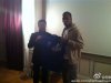 An undated handout shows Zhou Jun, director of Shanghai Shenhua Football Club, and Didier Drogba during a meeting in France