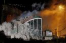 FILE - In this Nov. 13, 2007 file photo The New Frontier Hotel & Casino located on the Las Vegas Strip is imploded. A new resort could soon spring up on the vacant site of the former New Frontier casino, thanks to a partnership between Australian billionaire James Packer and former Wynn Las Vegas President Andrew Pascal. (AP Photo/Isaac Brekken, File)