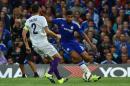 Chelsea's midfielder Ruben Loftus-Cheek (R) shoots around Fiorentina's defender Gonzalo (L) but misses the chance during the pre-season friendly at Stamford Bridge in London on August 5, 2015