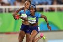 United States' Allyson Felix, right, hands off to English Gardner in a women's 4x100-meter relay rerun after dropping the baton in the race in the morning during the athletics competitions of the 2016 Summer Olympics at the Olympic stadium in Rio de Janeiro, Brazil, Thursday, Aug. 18, 2016. (AP Photo/Lee Jin-man)