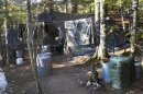 This photo released Wednesday, April 10, 2013 by the Maine Department of Public Safety shows a camp in a remote, section of Rome, Maine, where authorities believe Christopher Knight lived like a hermit for decades. Knight, known as the North Pond Hermit, was arrested Thursday, April 4, 2013, while stealing food from another camp in Rome. Authorities said he may be responsible for more than 1,000 burglaries. (AP Photo/Maine Department of Public Safety)