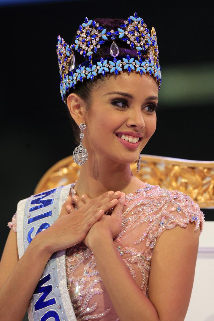 Megan Young of the Philippines smiles after being named Miss World 2013, during the grand final of the pageant, in Nusa Dua, Bali, Indonesia, Saturday, Sept. 28, 2013. (AP Photo/Firdia Lisnawati)