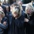 Relatives of Belarusian ice hockey player Ruslan Salei, killed in Wednesday's plane crash near Yaroslavl, mourn during a funeral ceremony in Minsk, Belarus, Saturday, Sept. 10, 2011. The chartered Yak-42 jet crashed Wednesday into the banks of the Volga River moments after takeoff from an airport near Yaroslavl. The crash killed 43 people, including 36 players, coaches and staff of the Lokomotiv Yaroslavl ice hockey team, many of whom were European national team and former NHL players. It was one of the worst aviation disasters ever in sports, shocking Russia and the world of hockey. The team had been heading to Minsk, Belarus to play its opening game of the Kontinental Hockey League season. (AP Photo/Dmitry Brushko)