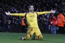 West Ham United's Spanish goalkeeper Adrian celebrates after scoring a penalty in the sudden death shoot-out to win the game at the English FA Cup Third Round football match replay against Everton in east London, on January 13, 2015