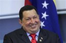 Venezuela's President Hugo Chavez smiles during a news conference in Brasilia