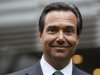 Lloyds Banking Group CEO Antonio Horta-Osorio poses outside the bank's headquarters on his first day back at work after taking a leave of absence due to exhaustion, in the City of London