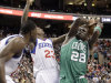 Boston Celtics' Mickael Pietrus (28), of France, collides with Philadelphia 76ers' Lou Williams (23) in the first half of an NBA basketball game on Friday, March 23, 2012, in Philadelphia. Pietrus was injured on the play. (AP Photo/Matt Slocum)