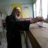 A man casts his vote during the second round of parliamentary run-off elections at Imbaba in Giza